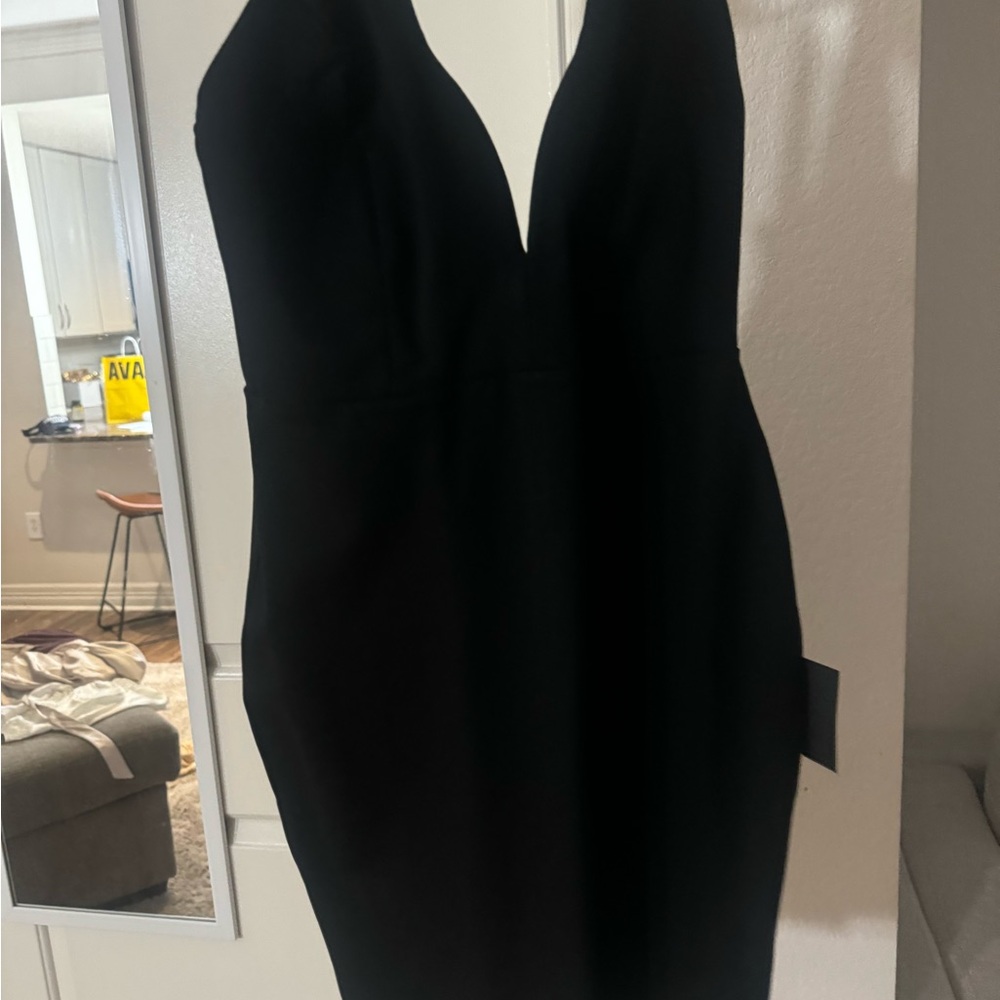 Unworn black mini dress
